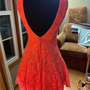 Vibrant Lace Dress with Deep V-Back